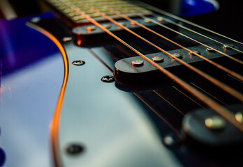 Abstract photo of an electric guitar and its parts macro photo. Music wallpaper and banner for...