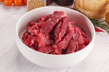 Raw beef meat - sliced strips