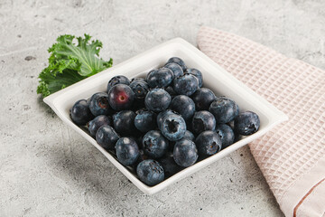Sweet ripe blueberry on the bowl