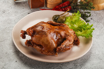 Baked small chicken with spices