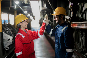 Engineer checking construction process railway and checking work on railroad station . Railway engineer checking machines in train station. Train engineer concept