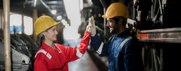 Engineer checking construction process railway and checking work on railroad station . Railway engineer checking machines in train station. Train engineer concept