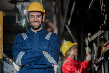 Engineer checking construction process railway and checking work on railroad station . Railway engineer checking machines in train station. Train engineer concept