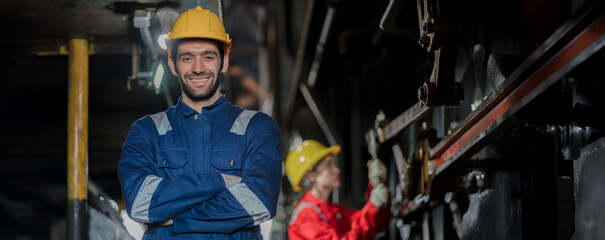 Engineer checking construction process railway and checking work on railroad station . Railway engineer checking machines in train station. Train engineer concept