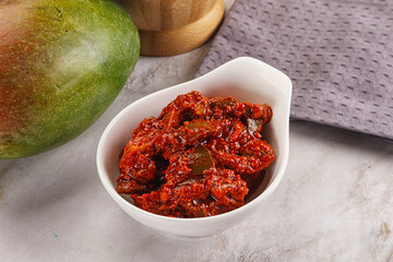 Spicy pickled raw green mango