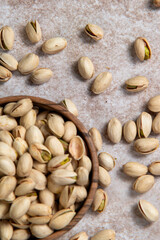 Pistachio vera, pistachio nuts, peeled pistachio nuts close-up on the table, healthy food, Tasty roasted pistachios, crunchy snack for healthy eating.