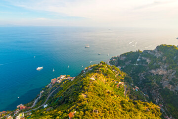 The photo showcases the scenic villas of Ravello and its surroundings, set atop cliffs with...