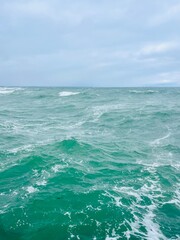 Fototapeta premium Natural seascape background, cloudy sea horizon