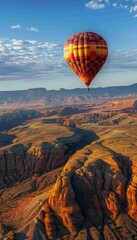 Obraz premium Stunning hot air balloon soaring over stgeorge, utah, showcasing desert beauty and serenity