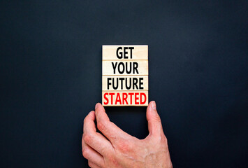 Get your future started symbol. Concept words Get your future started on beautiful wooden blocks. Businessman hand. Beautiful black background. Business get your future started concept. Copy space.
