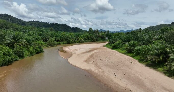 Aerial drone video on Plai Wha river at Phang Nga, Surat Thani, Thailand, river and forest, nature.