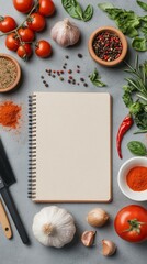 Fresh herbs and spices arranged artistically on a kitchen table with notepad for recipe ideas