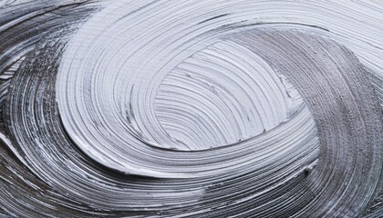 흰 캔버스 위에 물감으로 그려진 원형 브러시 스트로크