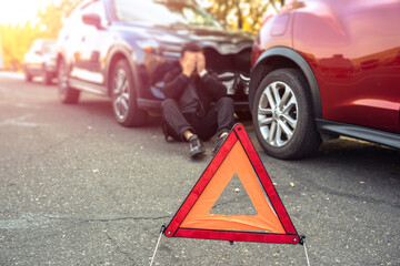 Car accident, traffic sign, desperate man
