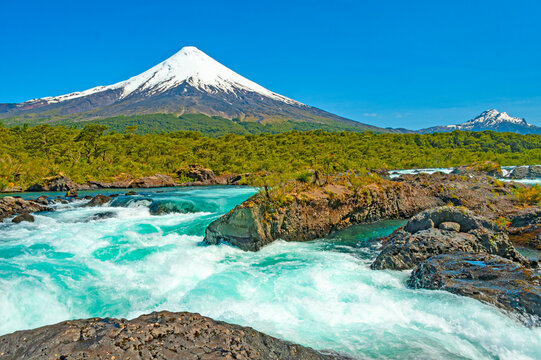 Petrohu&eacute; Waterfalls (Saltos del Petrohu&eacute;) in the Vicente P&eacute;rez Rosales National Park, with Osorno volcano in the background.