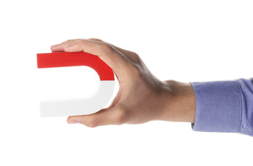 Man with horseshoe magnet on white background, closeup