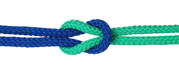 Colorful ropes tied in knot isolated on white. Unity concept