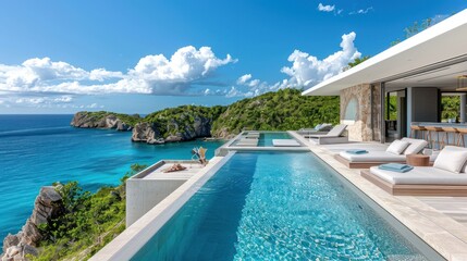 Fototapeta premium Luxurious oceanfront villa with infinity pool and stunning sea view.