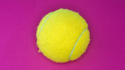 Tennis ball close-up, details, space for text, plain background