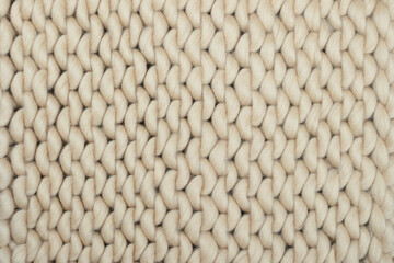 Close-Up of Bright Brown Chunky Knit Wool Texture – Perfect for Cozy Home Decor, Knitting Projects, Crafting Ideas, and Vibrant Handmade Textile Inspiration