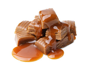 Tasty candies with caramel sauce isolated on white