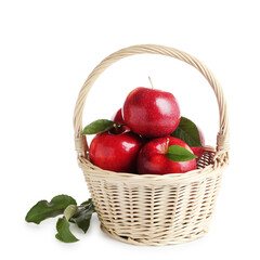 Fresh ripe red apples in wicker basket isolated on white
