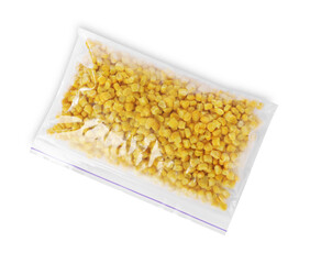 Frozen corn kernels in plastic bag isolated on white, top view