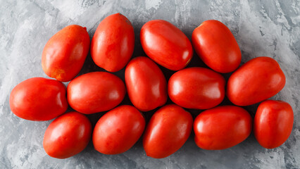 Red Tomatoes on Gray Concrete Background, Fresh Vegetable Harvest, Top View