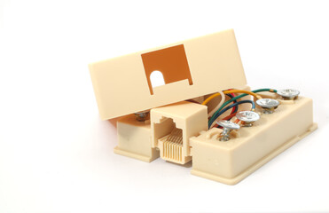 A Telephone Splitter Box, Single RJ45 Jack with 8 pins and 8 cords, on white background. Used to split and connect network cables