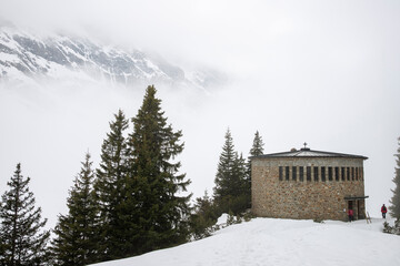 Foggy hike in mountains in winter