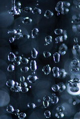 drops of water on dark background 