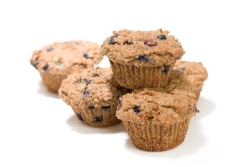 Homemade berry bran muffins on white background 