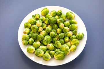 Group of Brussels sprout - Brassica oleracea - ready to be cut, cooked and. eaten or used as an ingredient in cooking. 