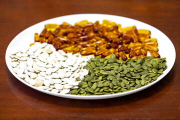 Pumpkin seeds in various versions, seed oil rich in nutrients for prostate treatment, men's health, magnesium, cardiovascular.