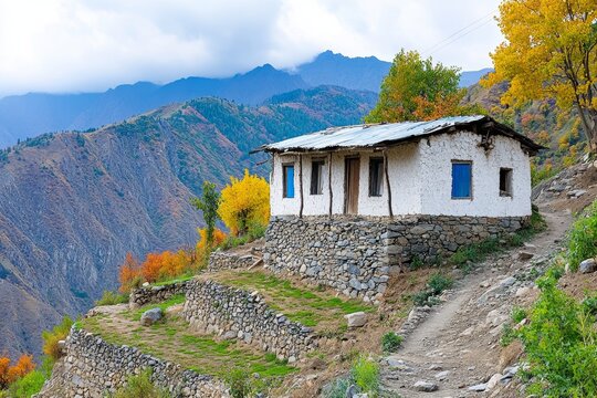 A picturesque depiction of Khinalug village, one of the world oldest mountain settlements, with stone houses on terraced slopes