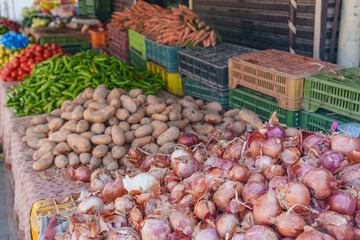 Beautifully displayed vegetables for sale at a small market