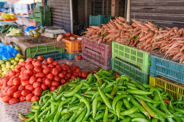 Beautifully displayed vegetables for sale at a small market