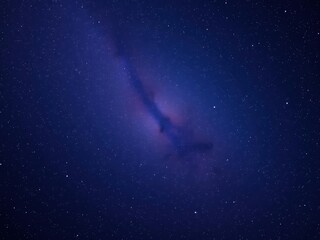 Naklejka premium Vibrant deep space nebula clouds with twinkling stars, creating a cosmic scene of awe and peace, cosmic, deep space