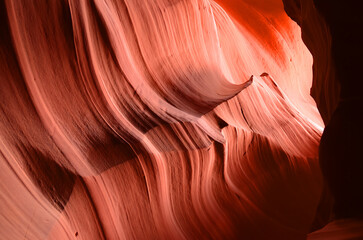 Antelope Canyon is a slot canyon in the American Southwest. It is on Navajo land east of Page, Arizona. Antelope Canyon includes two separate, scenic slot canyon sections