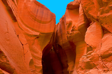 Antelope Canyon is a slot canyon in the American Southwest. It is on Navajo land east of Page, Arizona. Antelope Canyon includes two separate, scenic slot canyon sections
