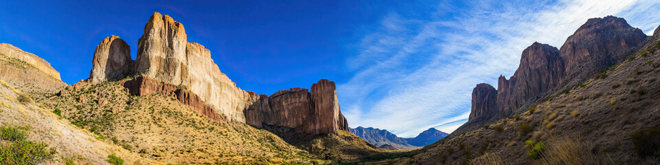 Big Bend Beauty: The dramatic landscape of Big Bend National Park, with towering cliffs and a clear blue sky.