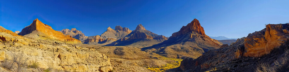 Big Bend Beauty: The dramatic landscape of Big Bend National Park, with towering cliffs and a clear blue sky.