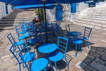 Beautiful blue garden café on a stone base