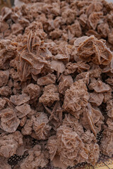 The rock, the desert rose, arranged in great heaps