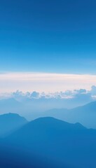 Fototapeta premium blue and clear sky vertical wallpaper mountains background