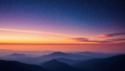 a view of the mountains and the sky at sunset