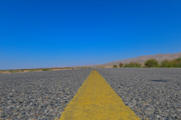 Desert road sand dunes in Xinjiang, China