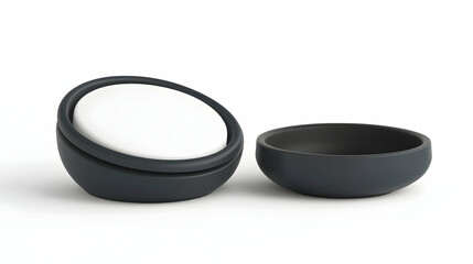 Two dark gray bowls, one with a white circular insert, on a white background.
