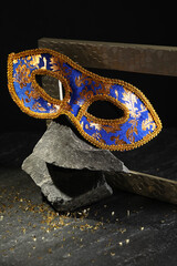 Beautiful bright carnival mask on dark background