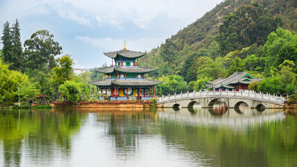 Lijiang Black Dragon Pool Park is a picturesque haven in Yunnan, featuring crystal-clear waters,...